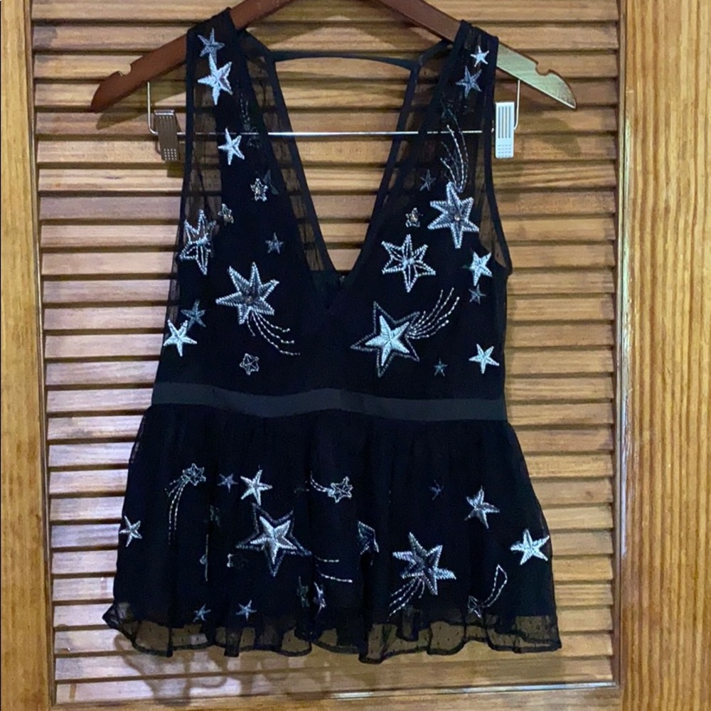 Black celestial peplum top